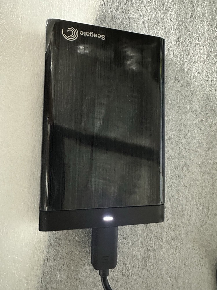 Seagate Backup Plus 1TB Portable Hard Drive MODEL SRD0SPO