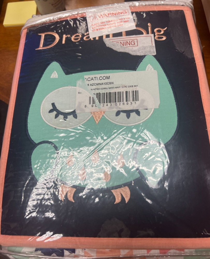 Bedding: NWOT "Dream Big" multicolored 10 piece crib set.
