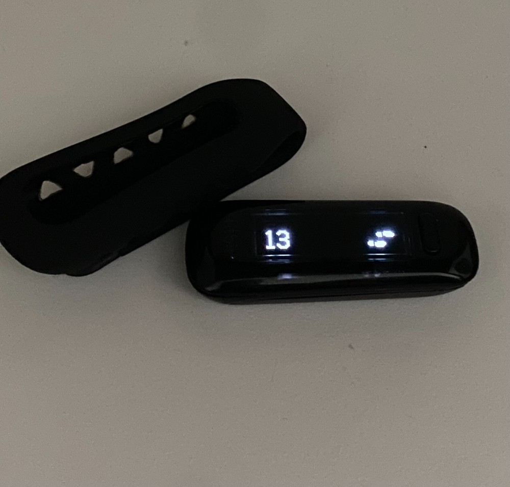 Fitbit One Black & Holder -version 6.46 new battery.PLEASE READ THE DESCRIPTION!