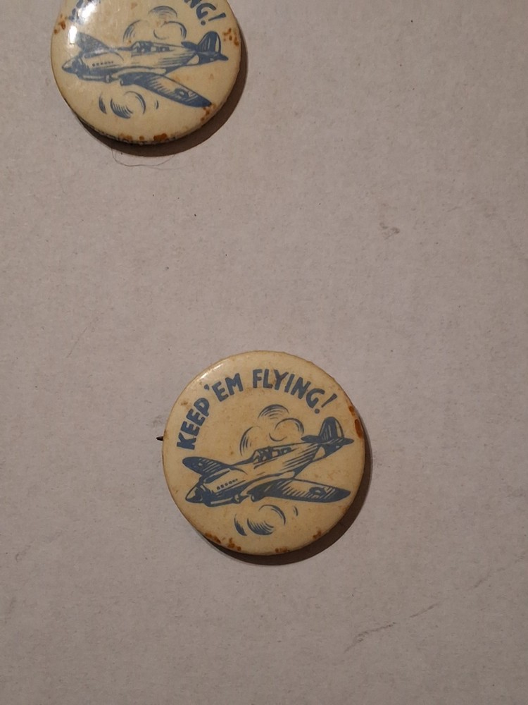WWII KEEP EM FLYING! pinback with fighter plane illustration