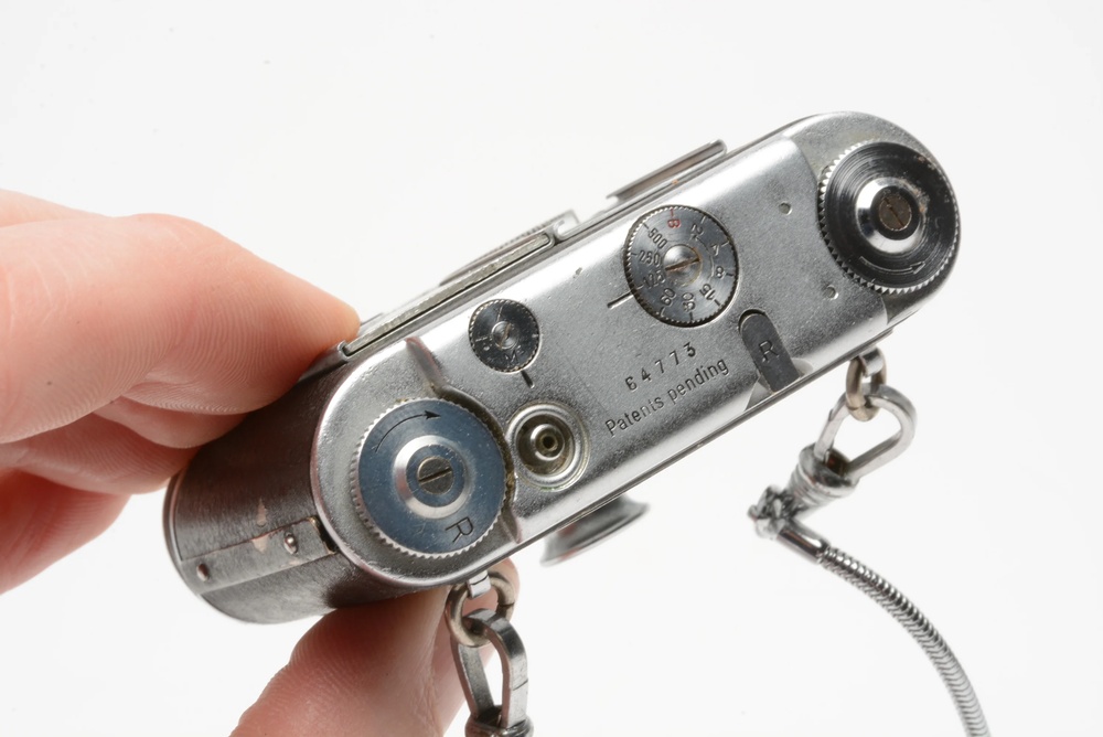 Tessina subminiature compact camera, tested, works great, w/strap