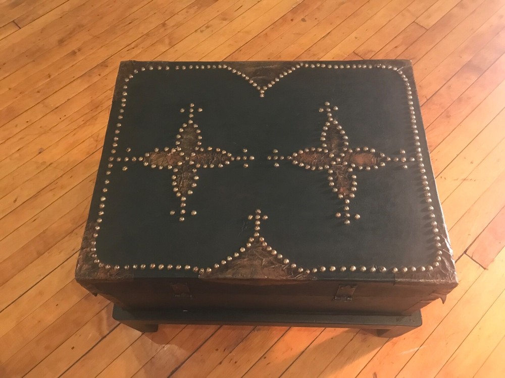 antique trunks chests on a custom stand