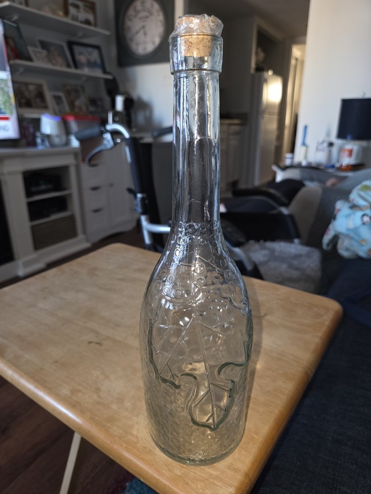 Decorative Clear  Glass Bottle with Embossed Leaf Pattern