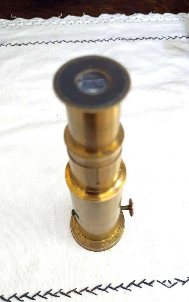 Old brass field microscope