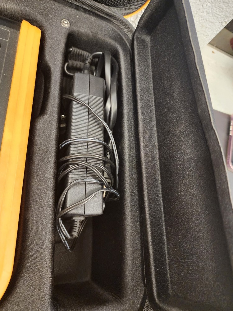 Dymo XTL 500 Label Maker bundle W/Case, Charger Owners Manual.