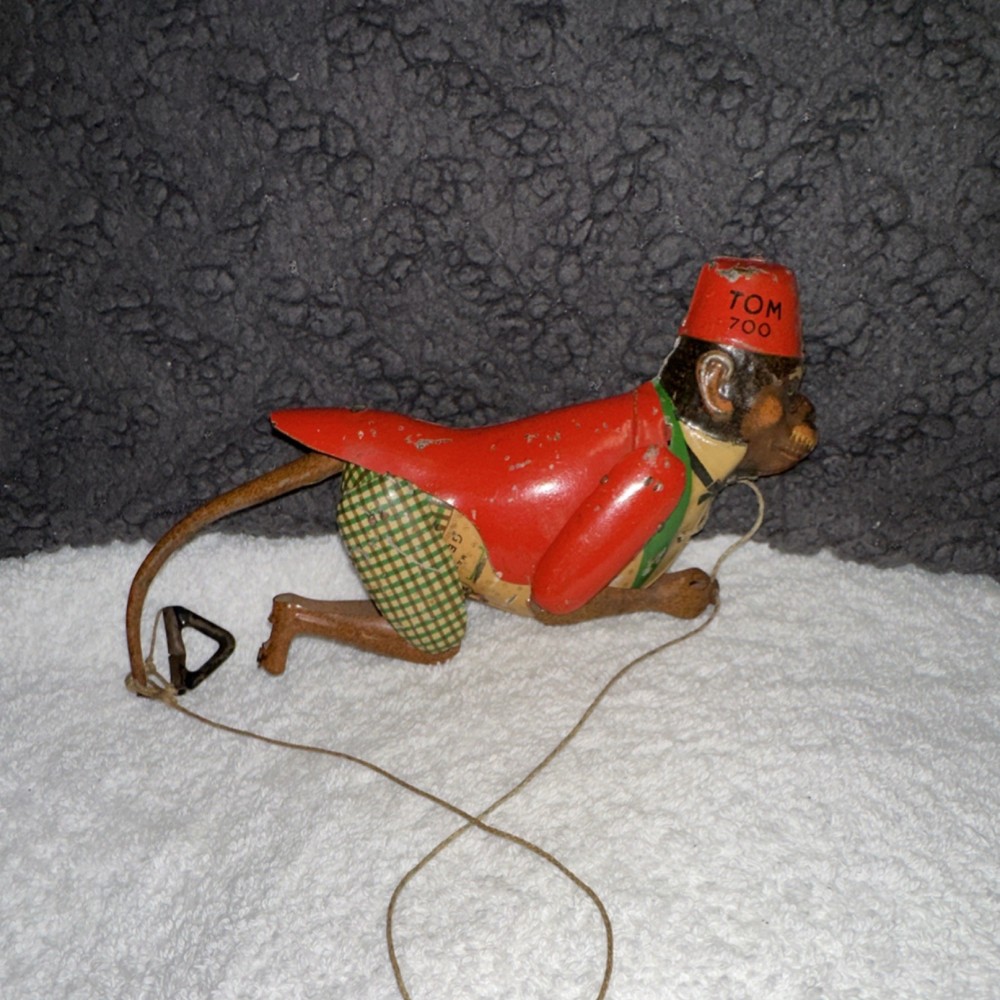 TOM Vintage Tin Monkey Pull Toy Red Jacket