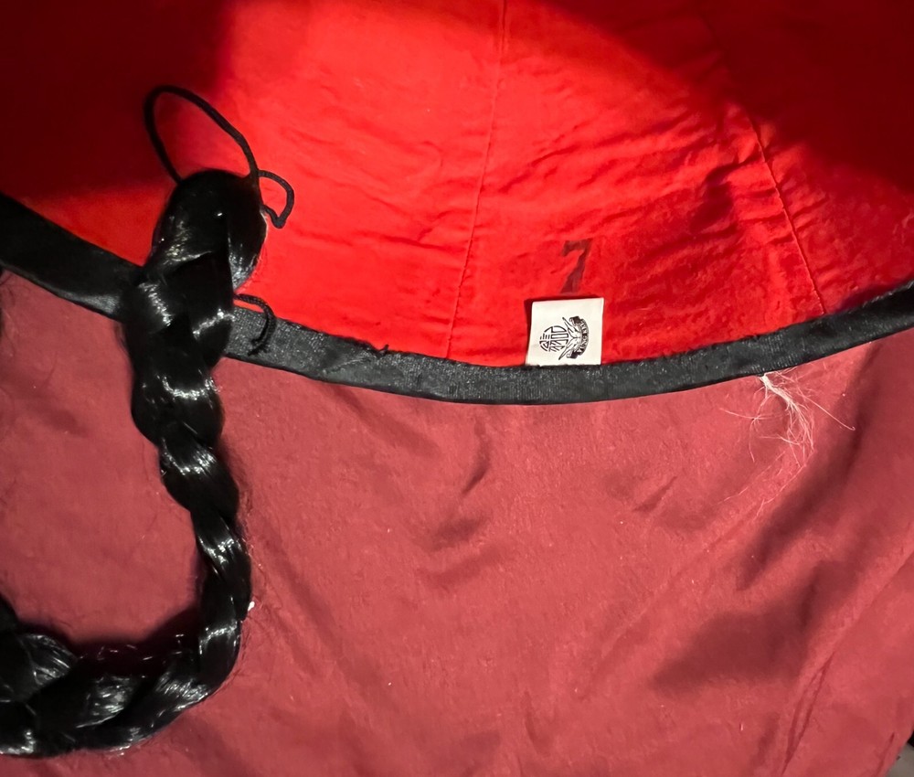 Oriental costume hat with long black braid