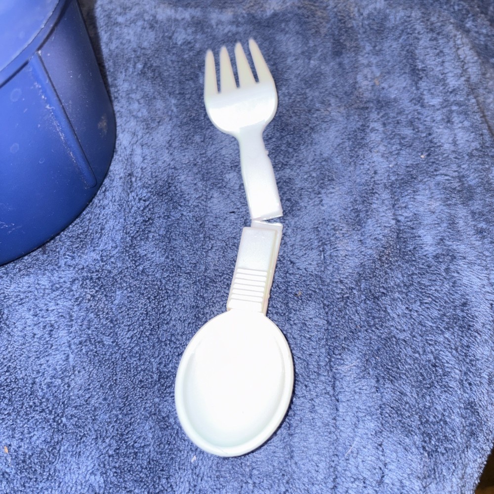 Insulated Food Storage Container With Folding Spoon And Fork