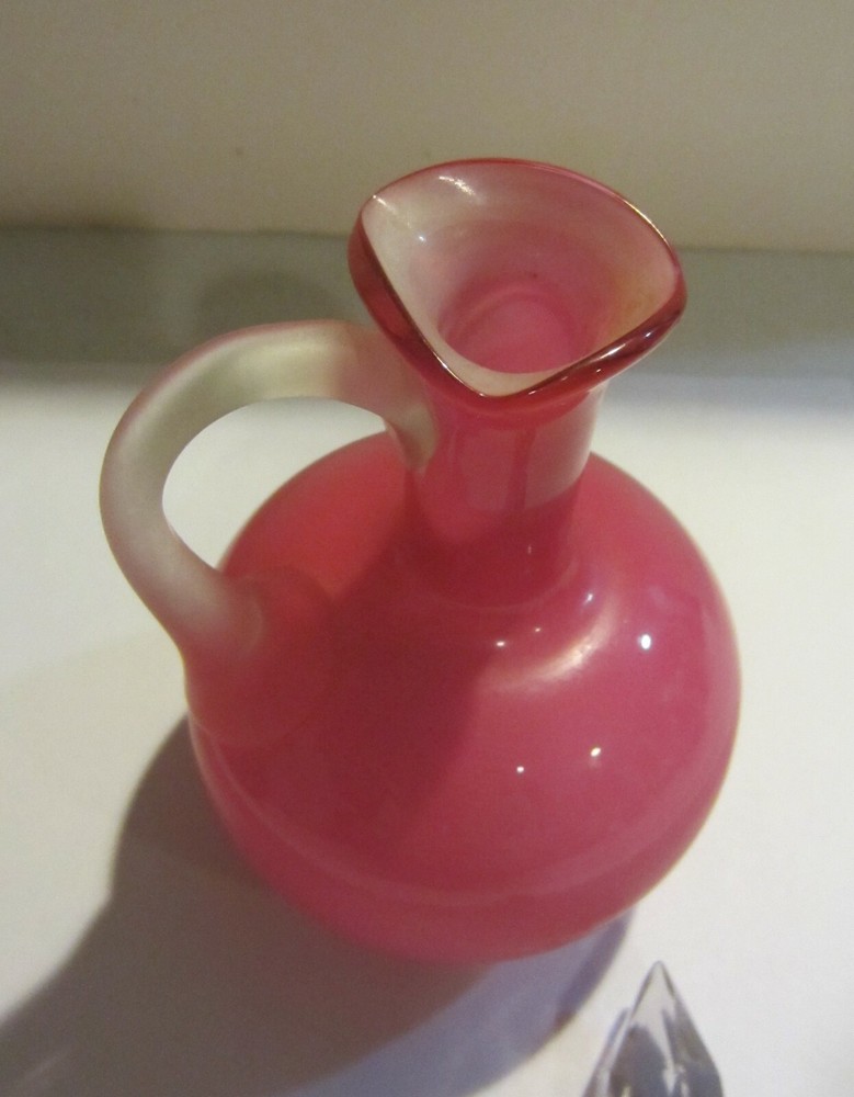 Frosted cranberry color perfume bottle
