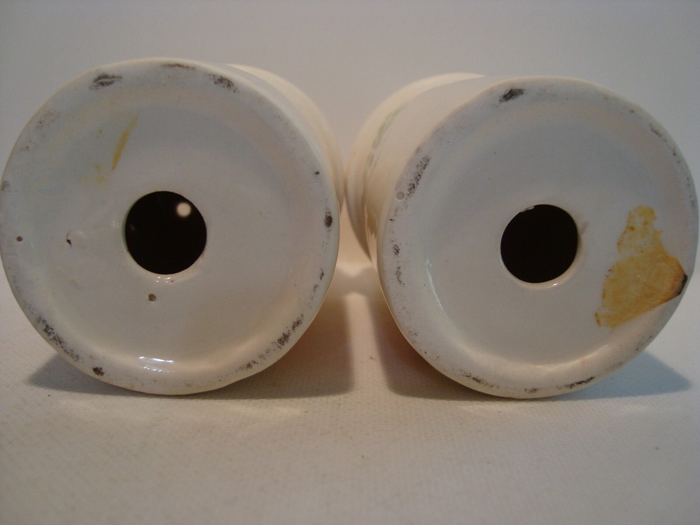 Large white porcelain floral pattern salt & pepper shaker set.
