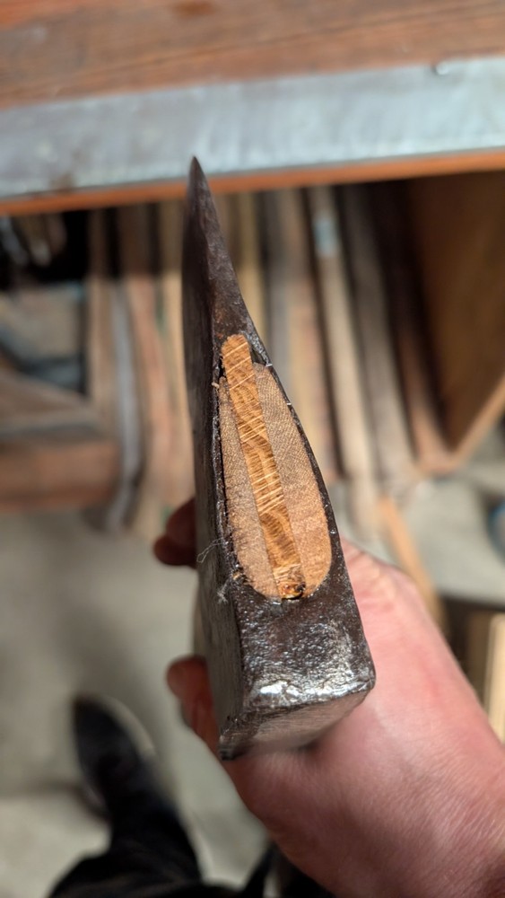 Kelly works axe and tool