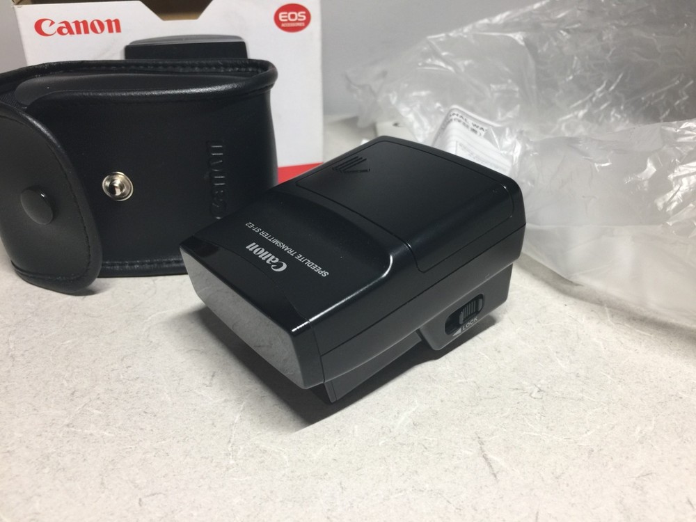 Canon Speedlite Transmitter ST-E2 manual EOS accessory shoe mount flash trigger