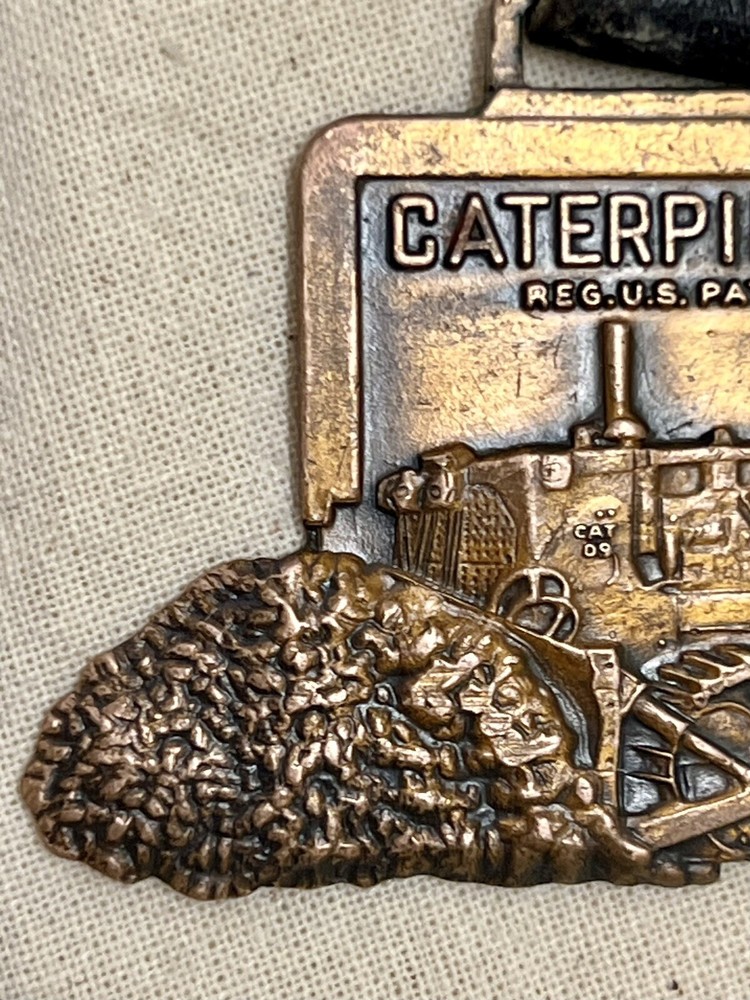 1960’s Caterpillar D9 Brass Medallion With Leather Belt Loop