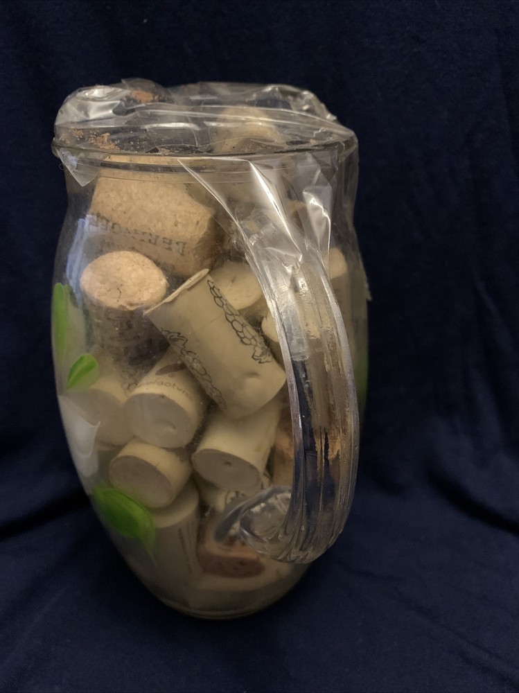 Wine Bottle Corks In Hand Painted Pitcher