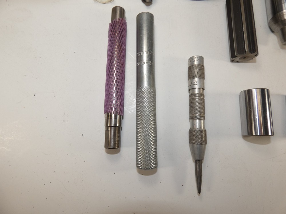 Set of eleven machinist tools, extractors, bits, etc.
