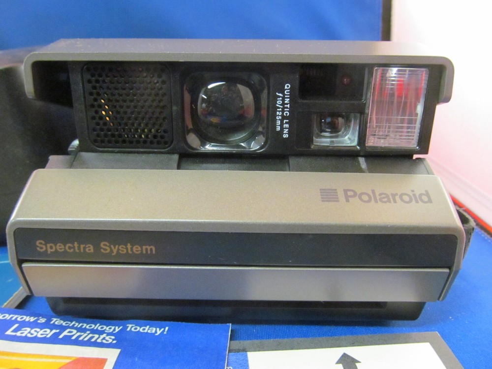 POLAROID SPECTRA SYSTEM CAMERA WITH STRAP CASE & MANUAL UNTESTED