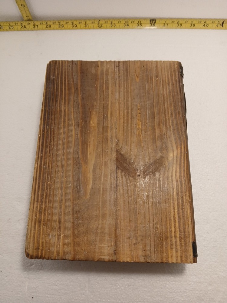 small wooden box with hinged lid