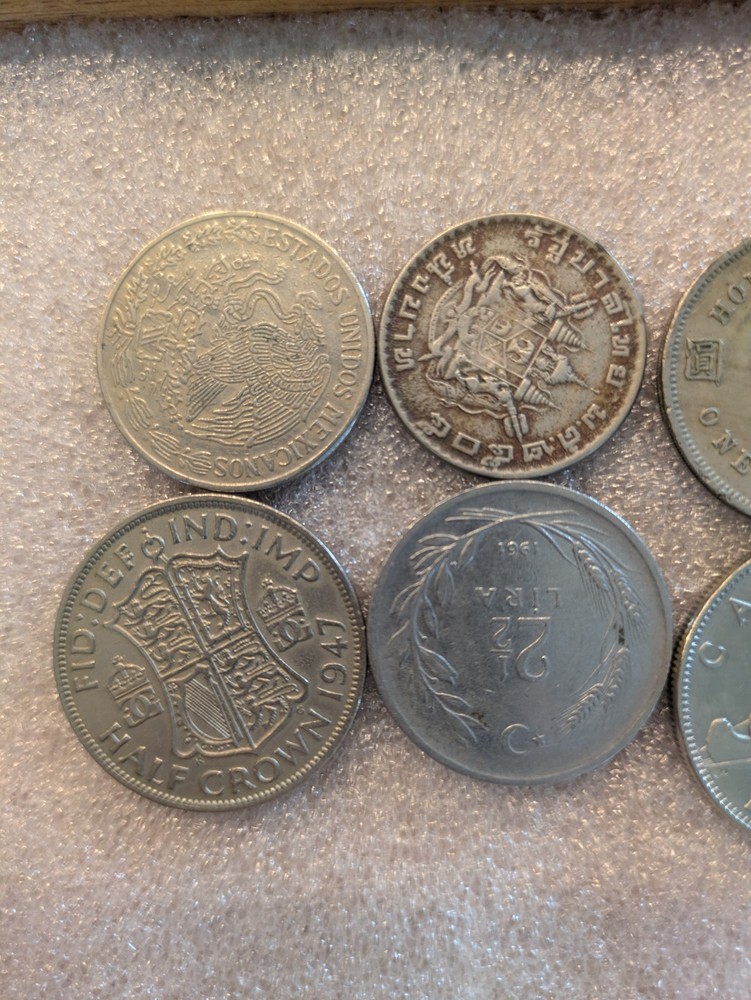 10 misc vintage foreign coins