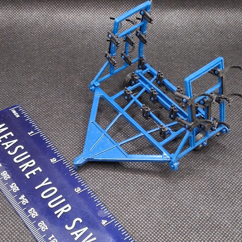 ERTL Ford Winged Chisel Plow Cultivator, Blue, 1/64