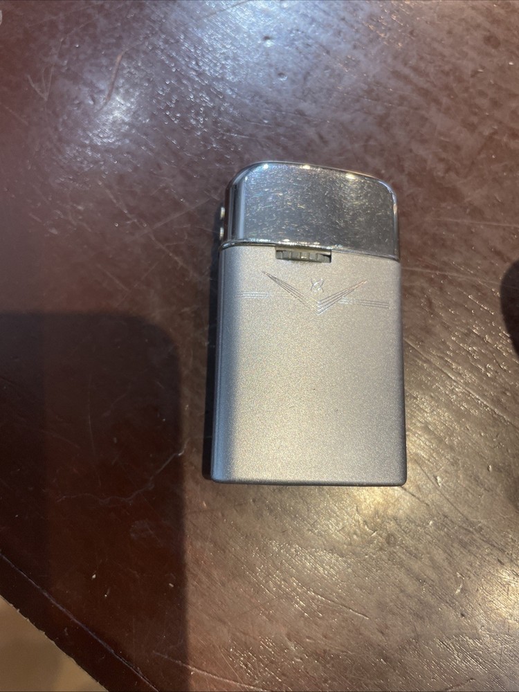 Vintage 1960’s Ronson Lighter With Chevron Atomic Design