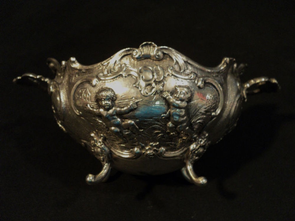 ANTIQUE CONTINENTAL SILVER CHASED BOWL, CHERUB DESIGN