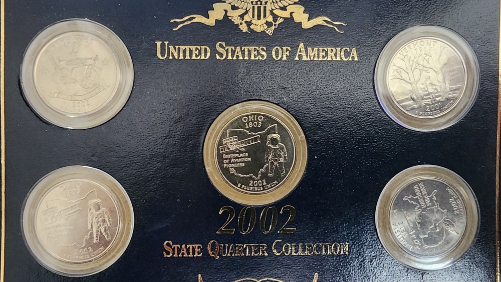 Coins uncirculated 5 piece 2002 Quater set