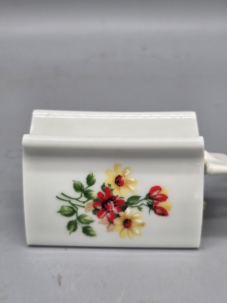 NOS Indispensable Dispenser Toothpaste Tube Roller Pair Flower Moth