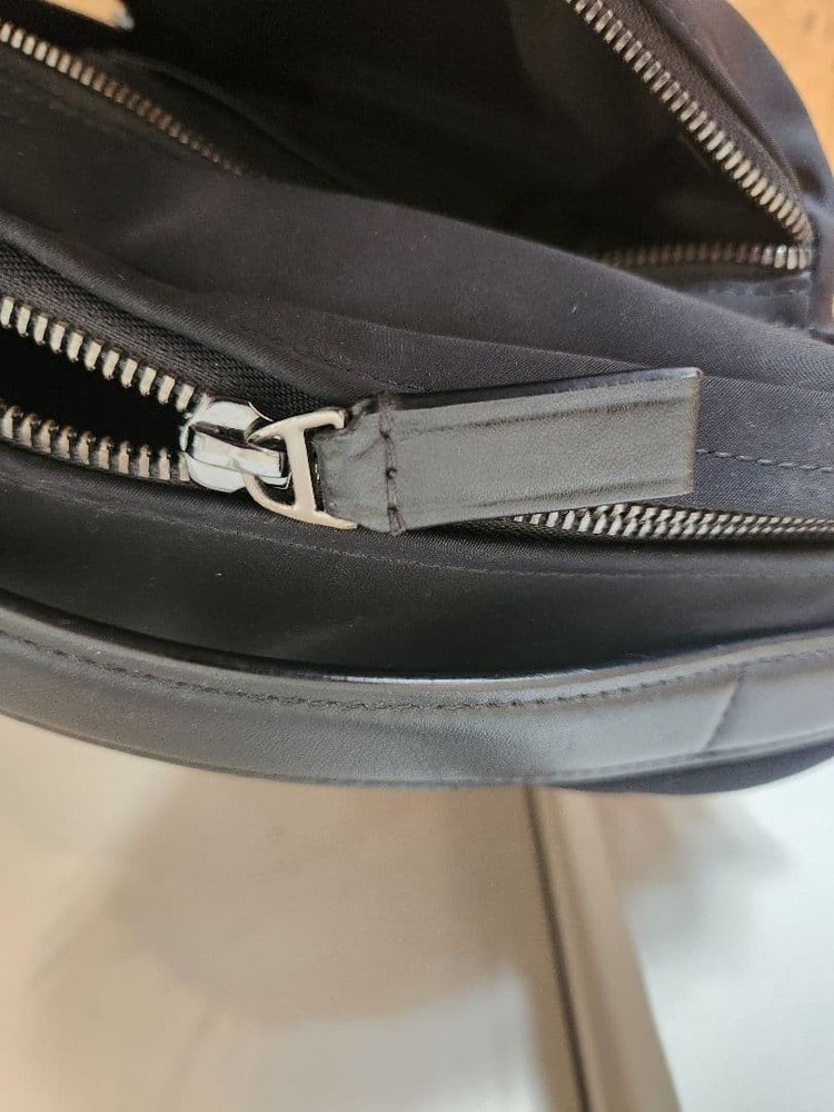 TUMI black backpack