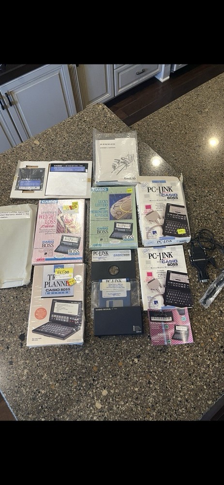 Casio Boss SF-7500 64KB  DIGITAL DIARY w/cables, PC-Link, Xtra Software NEW