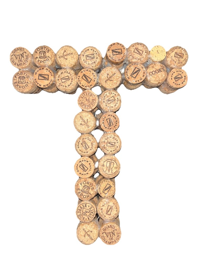 Letter T made of champaign / wine corks