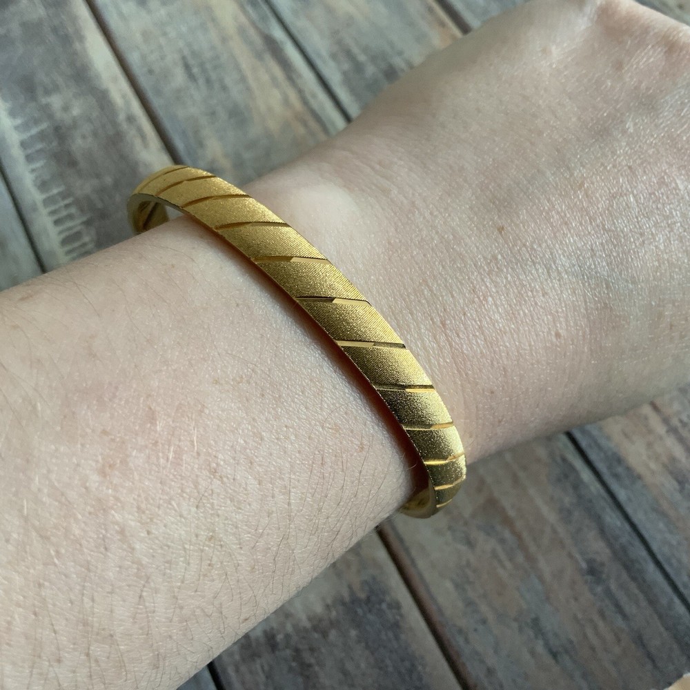 Classic MONET medium sized etched textured diamond dust stripped bangle in gold