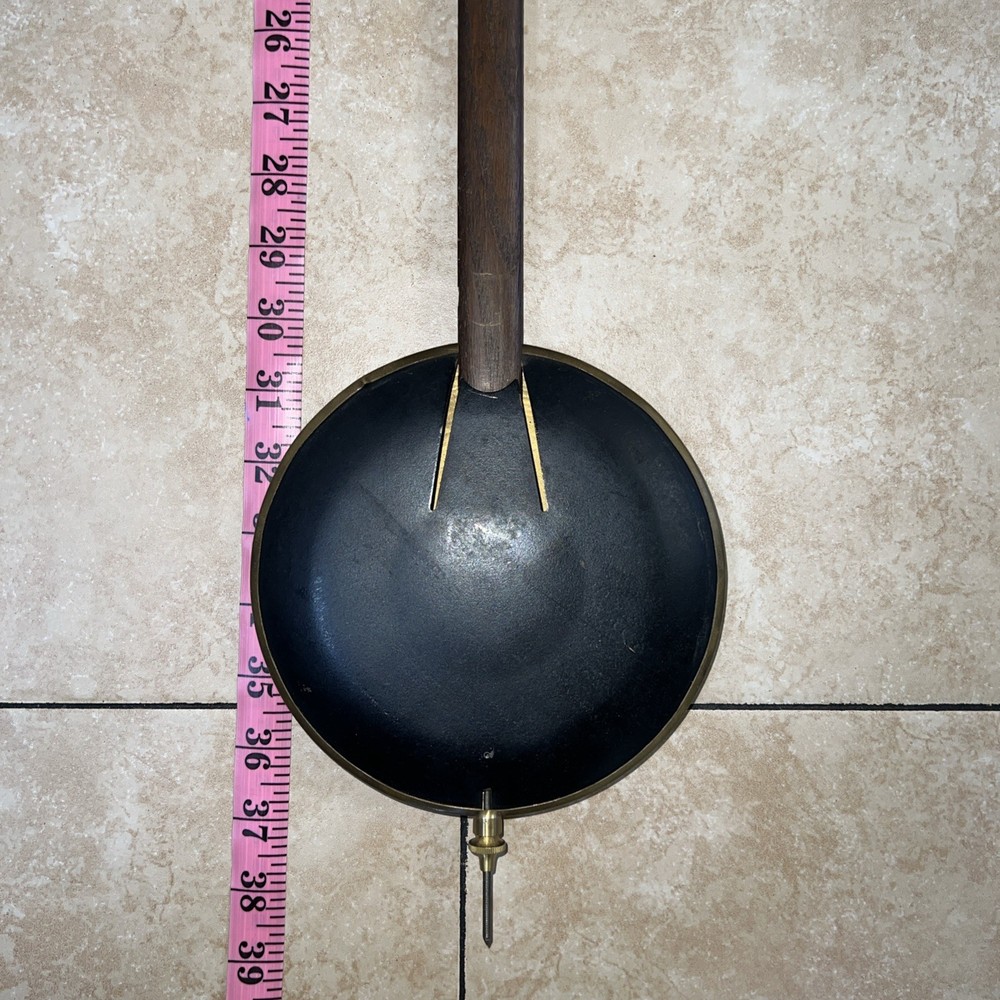 Junghans vintage grandfather clock pendulum.