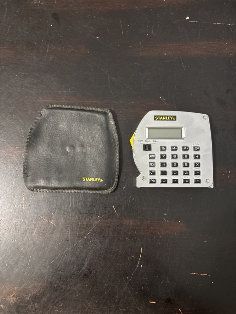 Vintage STANLEY TOOLS Powerlock Calculator/Clock Combination with Leather Case.