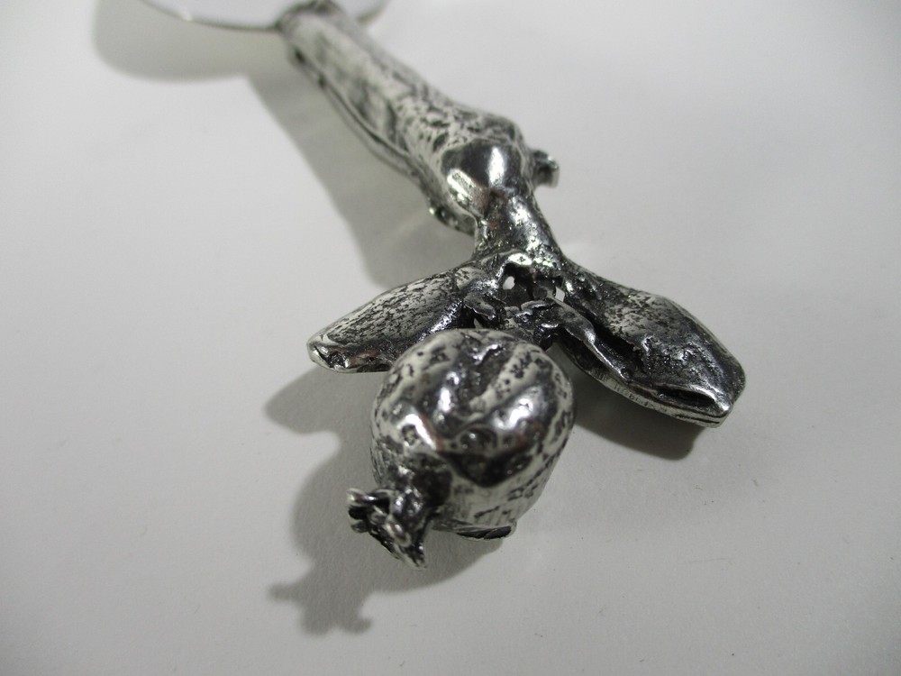 pewter- handled cheese spreader handcrafted pomegranate design Patrick Meyer