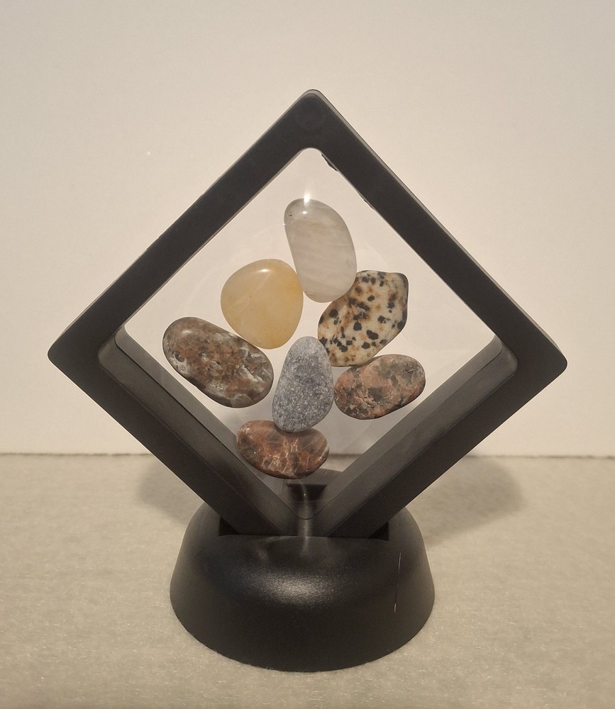Assorted crystals in  floating frame