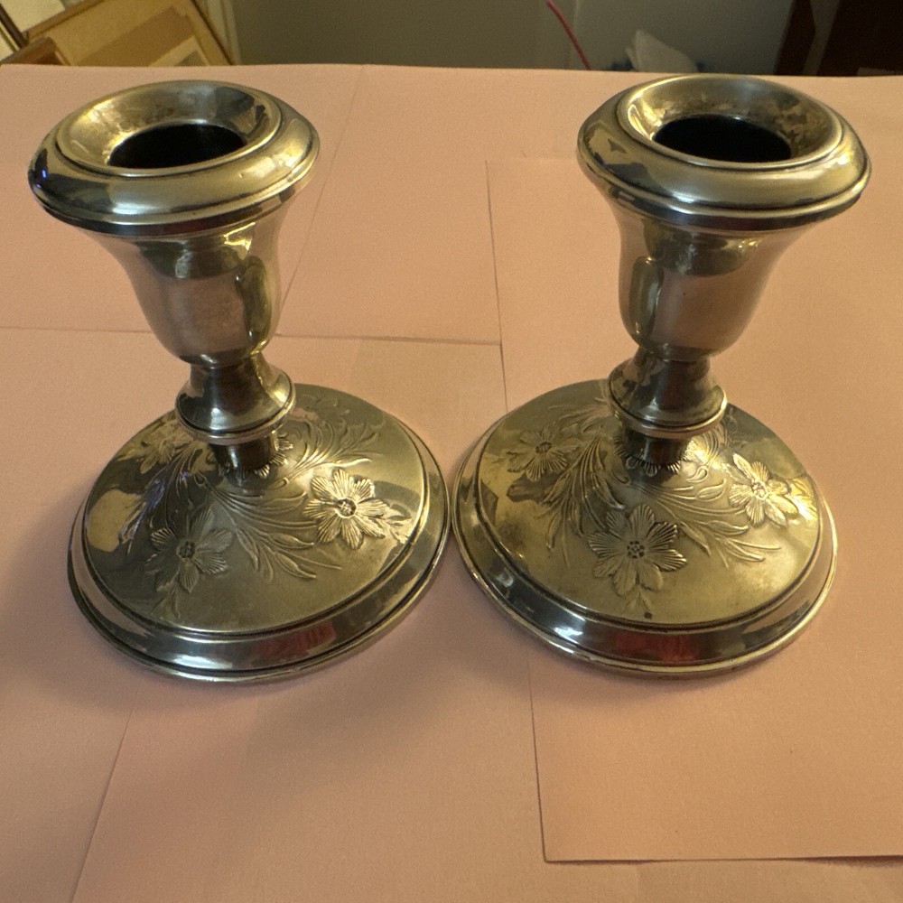 Sterling silver weighted candleholders