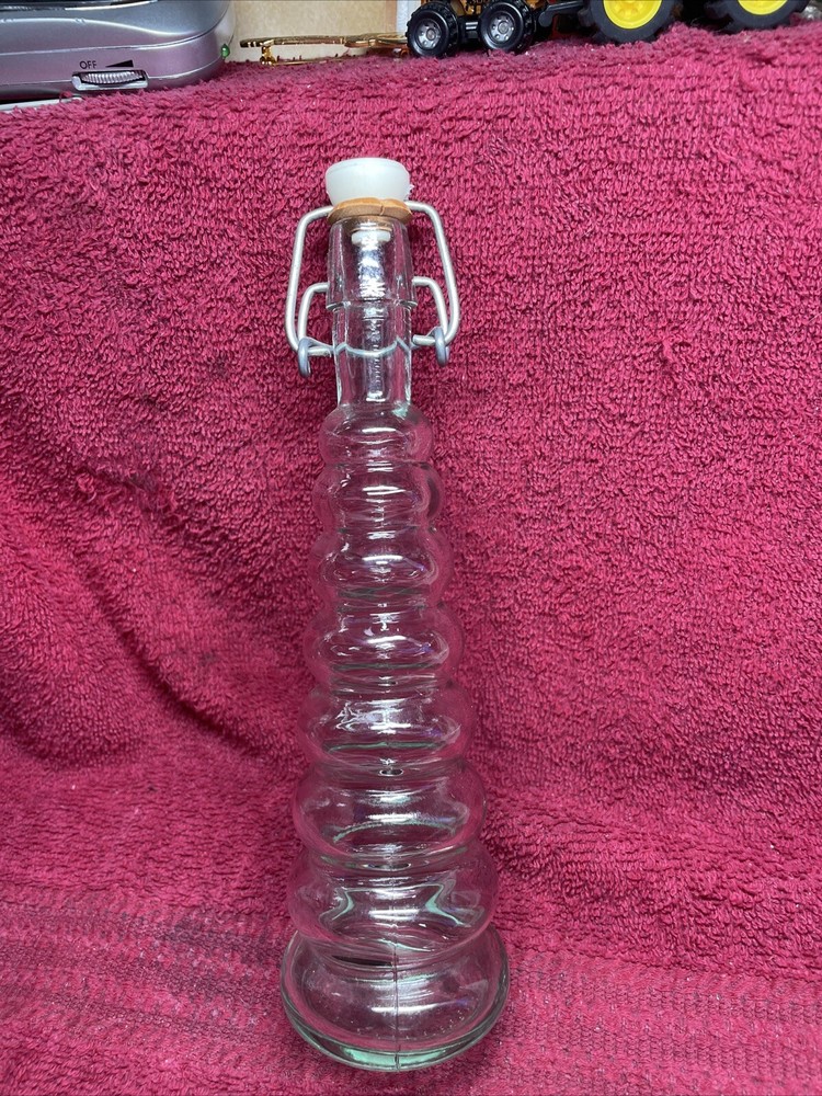 Graduated Glass 8" Bottle with metal & Hard Plastic stopper empty.