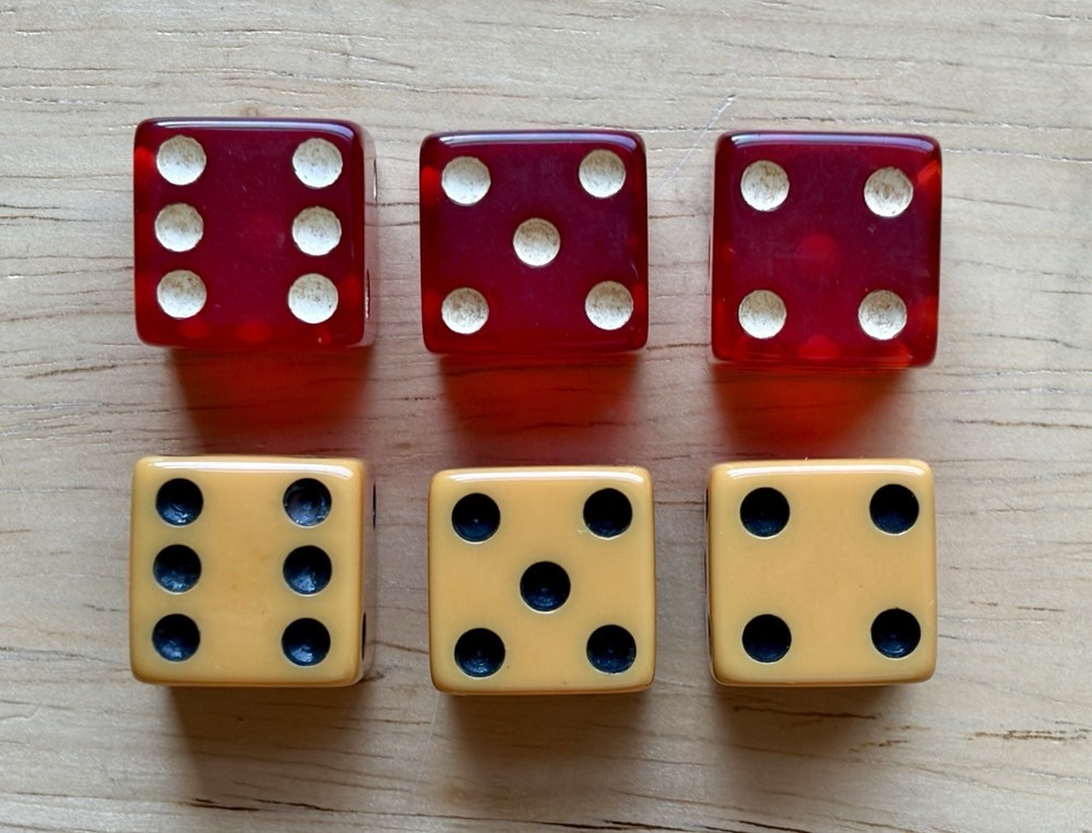 SIX VINTAGE BAKELITE DICE RED BUTTERSCOTCH