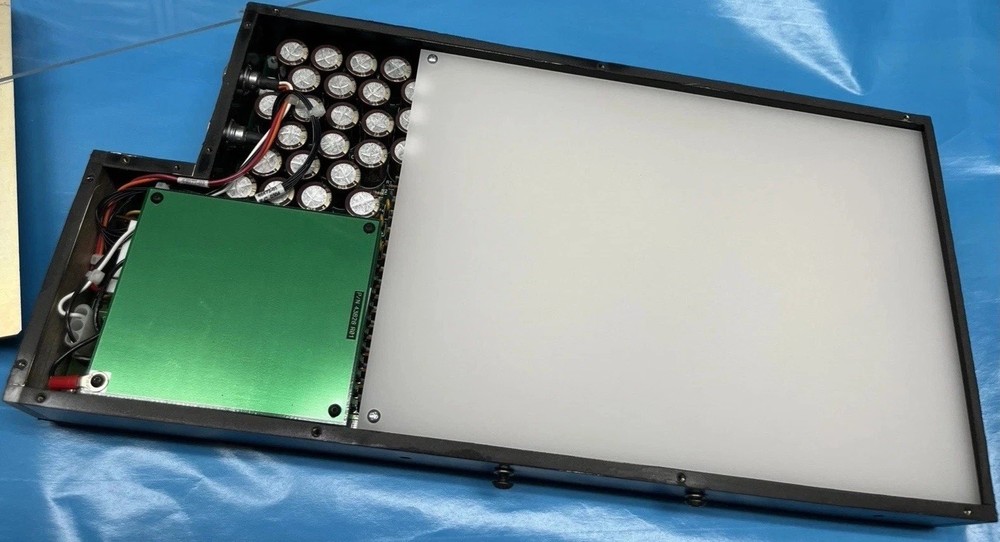Electronic Chips Inside Testing Light Box For Perhaps Plastic Bottles Integrity.