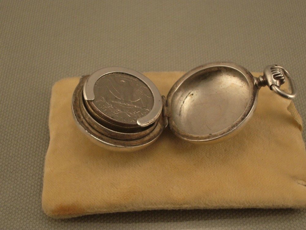 ANTIQUE SILVER COIN HOLDER