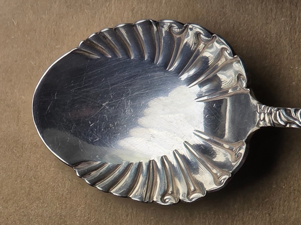 ANTIQUE E.P. ROBERTS & SONS FLORAL REPOUSSE SPOON STERLING SILVER