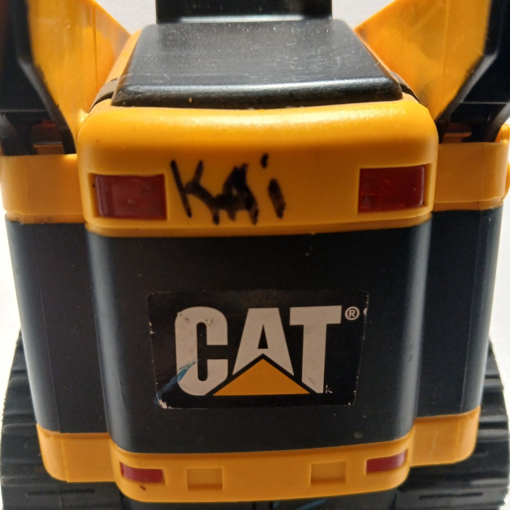 Caterpillar (CAT) toy skid steer loader, likely a "Big Builder". UNTESTED