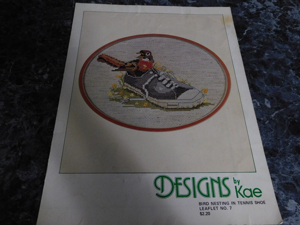 Bird Nesting in Tennis Shoe by Kae Leaflet 7