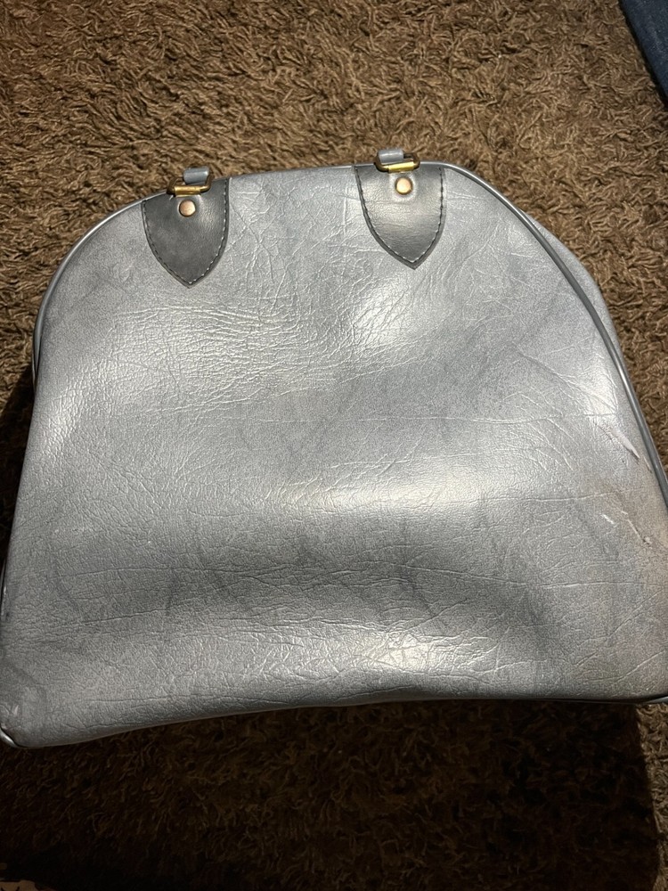 vintage grey carpet bowling bag with ball rack inside