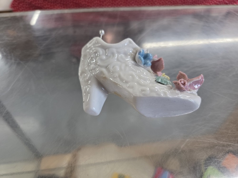 VINTAGE PORCELAIN BOOT PUSH PIN CUSHION.