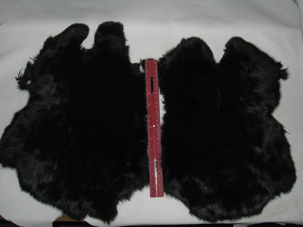 2 VERY NICE BLACK DYED RABBIT SKINS