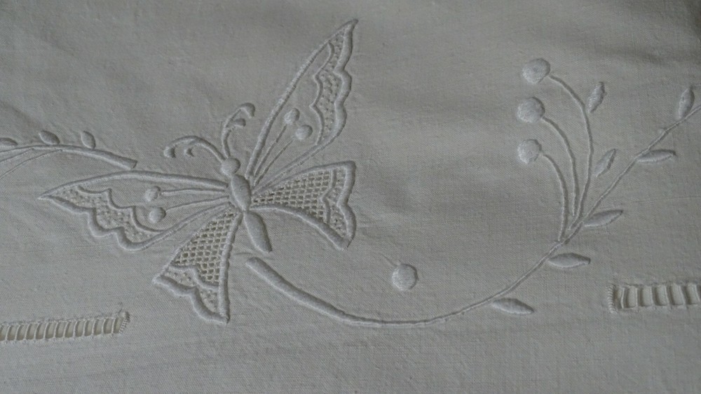 hand embroidered butterfly and mimosa sheet