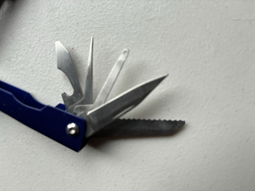 Wolf Multi-Pliers, Wire Cutter & Belt Loop Holder with smaller blue Multi-pliers