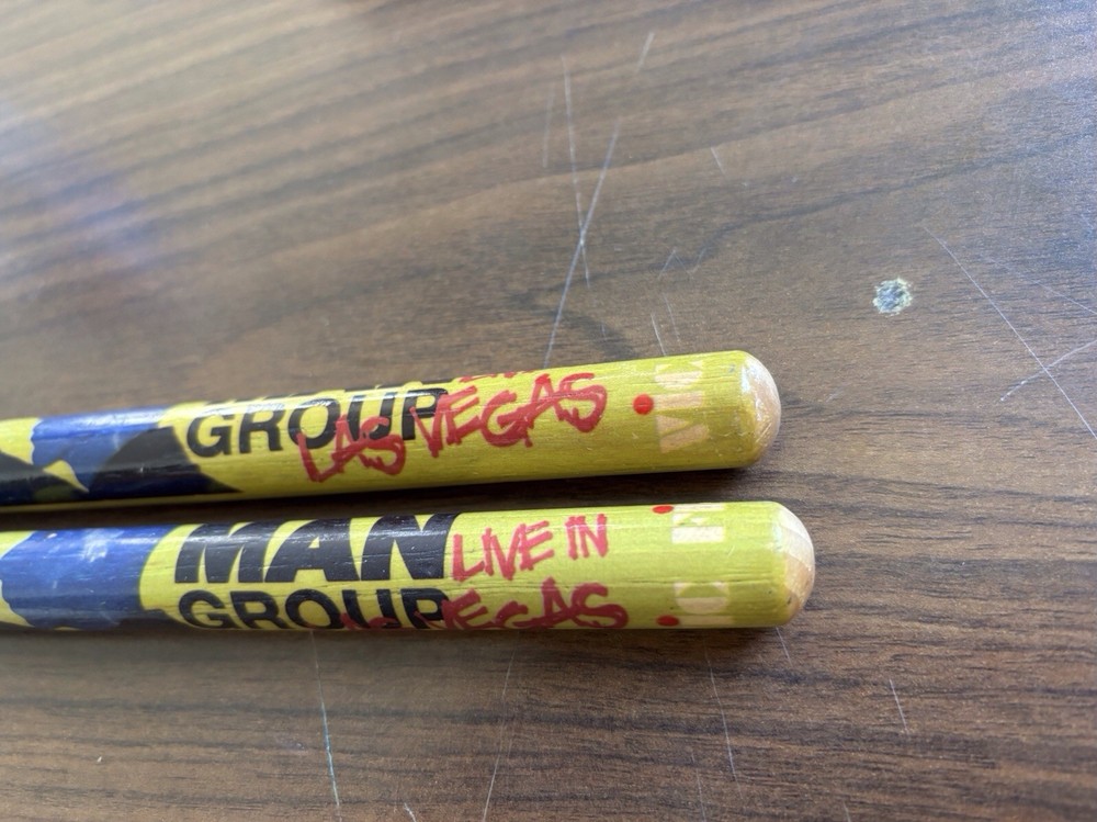 2 Used Blue Man Group" drum sticks