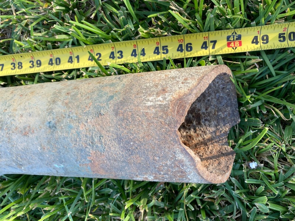 Antique cast iron tree hitching post. 4' by 4" wide. Piece broken off bottom.